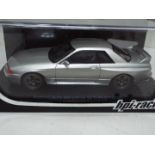 HPI Racing - Slot Car in 1:32 Scale - # 8522. Nissan Skyline GT-R (R32) Jet silver metallic.