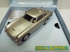 Scalextric - Slot Car model in 1:32 Scale - # C3162A Aston Martin DB5 Featuring James Bond 007.