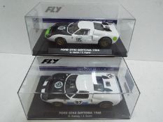 FLY - 2 x Slot Cars in 1:32 scale. # A2013 and # A2021. Both models are Ford GT40's.