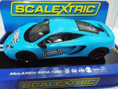 Scalextric - Slot Car model in 1:32 Scale - # 3328 McLaren MP4-12C. Range Presentation.