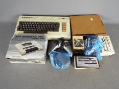 Commodore - A collection of vintage computer equipment and games including a Commodore VIC20 with