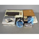 Commodore - A collection of vintage computer equipment and games including a Commodore VIC20 with