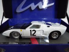 Le Mans - Slot Car in 1:32 Scale - Ford GT 40 no. 12 - 24. Drivers - Attwood / Schiesser.