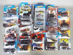 Hot Wheels - 24 carded plus a boxed 5 pack 'Batman ' and 'Avengers' themed the Hot Wheels.