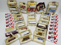 Lledo - Collection of boxed Diecast Vehicles. Vans, Buses, Trucks, Carriages and Cars.