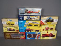Corgi - A collection of 11 x boxed trucks in 1:50 scale including # CC11407 Bedford TK luton van in
