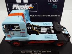 FlySlot - Slot Car model in 1:32 Scale - Supertrucks. # 203102 MAN TR 1400 FIA ETRC 2009.