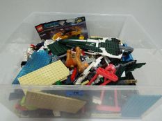 Lego / Various - Small plastic tub filled with Lego and other spurious toys. 3.