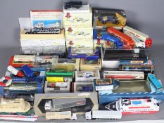 Corgi - Minichamps - Matchbox - A collection of 24 x boxed models in various scale with 14 x loose