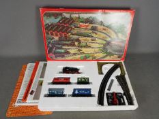 Hornby - A boxed # R873-9130 00 gauge electric train set with an 0-4-0 tank engine, 4 x wagons,