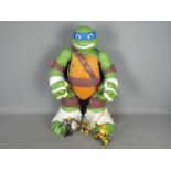 Playmates - TMNT - A Giant 24" Teenage Mutant Ninja Turtles Leonardo Play Set and 3 x smaller