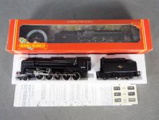 Hornby - A boxed Hornby OO Gauge R264 Class 9F 2-10-0 steam locomotive and tender Op.No.