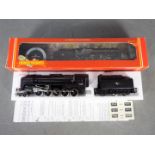 Hornby - A boxed Hornby OO Gauge R264 Class 9F 2-10-0 steam locomotive and tender Op.No.