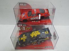 SCX - 2 x Slot Cars in 1:32 scale. # 63390 Ford Nascar Kenseth and # 63430 Chevrolet Monte Carlo.