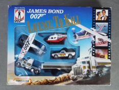 Matchbox - James Bond - A boxed 1989 James Bond Licence To Kill set with tanker truck, pickup truck,