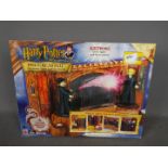 A Harry Potter And The Philosopher's Stone Powercaster electronic spell-casting playset by Mattel,