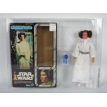 Star Wars, Kenner - A graded Kenner 1977 Star Wars 'Princess Leia' large 12" action figure.