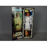 Palitoy - A boxed Princess Leia Organa figure. # 33327. She stands 11.