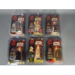 Star Wars, Hasbro - Six carded Hasbro Star Wars Episode 1 3 3/4" action figures with Comm Talk Chip.