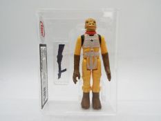 Star Wars - A loose vintage and graded Star Wars TESB 3 3/4 action figure 'Bossk'.