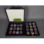 Star Wars - Hollywood Super Star - A cased set of 24 x gold coloured coins with colour images on