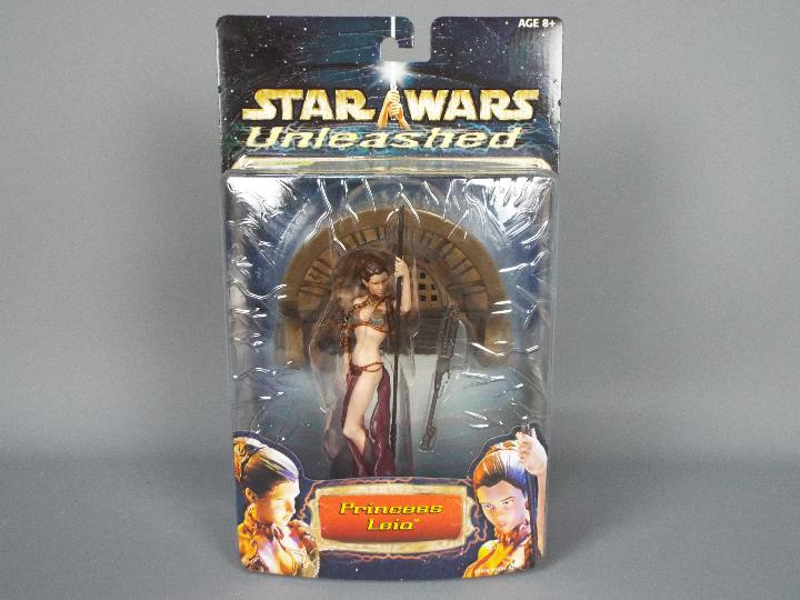 Star Wars - Hasbro - An 8" Princess Leia figure from the Unleashed series dated 2002. # 84936.