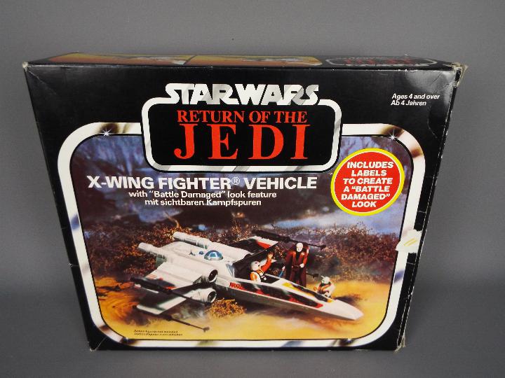 Star Wars - A boxed, vintage Kenner X Wing Fighter Vehicle with Battle Damaged look feature, - Image 7 of 8