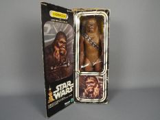 Star Wars, Kenner - A boxed Kenner #388600 1977 Star Wars 'Chewbacca large 12" action figure.