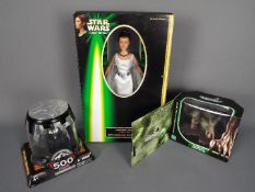 Star Wars, Hasbro - Three boxed Star Wars action figures in various sizes.