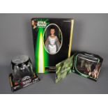 Star Wars, Hasbro - Three boxed Star Wars action figures in various sizes.