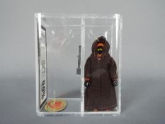 Star Wars - A loose vintage and gold graded Star Wars 'A New Hope' 3 3/4 action figure 'JAWA' .