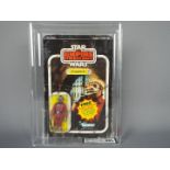 Star Wars, Kenner - A graded Kenner 1980 Star Wars TESB 'Snaggletooth' 3 3/4"action figure.