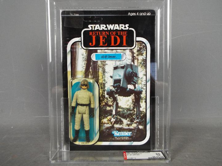 Star Wars, Kenner - A graded Kenner 1984 Star Wars ROTJ AT-ST Driver3 3/4" action figure.