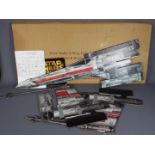 Star Wars - A large cardboard X Wing Fighter mobile shop display in its original shipping box dated