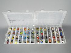 Lego - A collection of 56 x Lego figures including Father Christmas, Superman, a genie and similar.