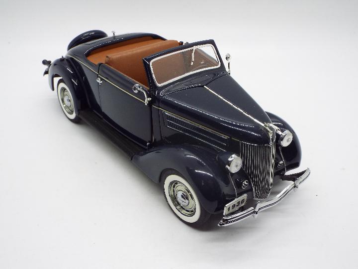 Danbury Mint - A boxed Danbury Mint 1:24 scale 1936 Ford Deluxe Cabriolet. - Image 2 of 5