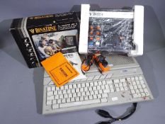 Atari - Binatone - An Atari 520 STFM and a boxed Binatone TV Master MK6 TV game.