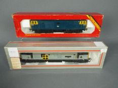 Hornby - Two boxed OO gauge diesel locomotives from Hornby. Lot includes Hornby R402 Class 37 Op.No.