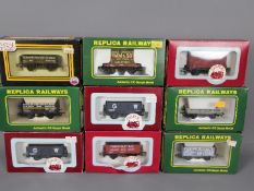 Dapol - Replica Railways - 9 x boxed 00 gauge wagons including # 13101 Plank Container wagon Pimm &