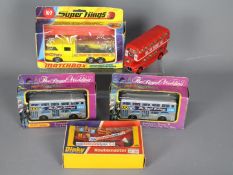 Matchbox, Dinky Toys, - Four boxed diecast model vehicles with one unboxed model diecast bus.