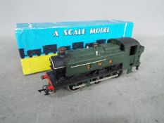 Graham Farish - A boxed 00 gauge pannier tank engine operating number 9410 in GWR livery.