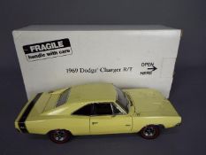 Danbury Mint - A boxed Danbury Mint 1:24 scale 1969 Dodge Charger R/T.