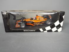 Minichamps - A boxed 1:18 scale Minichamps #100010014 Orange Arrows Asiatech A22 Formula 1 Racing