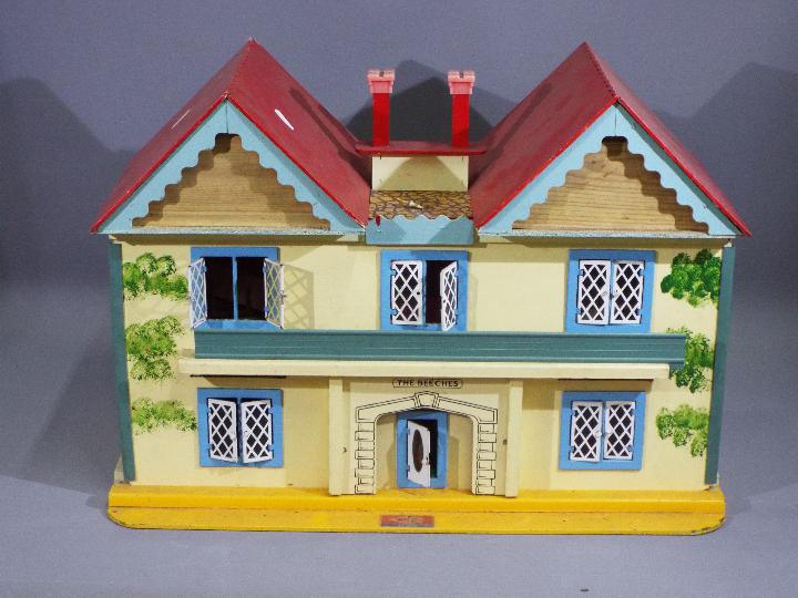 GB Toys (Gee Bee) - A vintage GB Toys wooden two storey Dolls House 'The Beeches'.