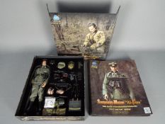 DiD - A boxed 1:6 scale WW2 action figure 'Sergeant-Major Wolfram' by DiD.