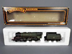 Mainline - A boxed 00 gauge 4-6-0 standard Class 4 loco operating number 75001.