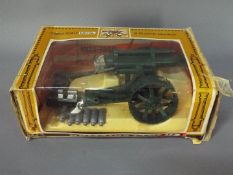 Britains - A boxed Britains #9740 18" Heavy Howitzer.