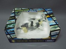 Franklin Mint - A boxed Franklin Mint 'Armour Collection' 1:48 scale B11E764 AV8 Harrier GR3 (RAF).