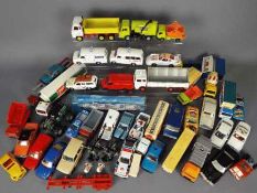 Corgi, Matchbox, Dinky Toys, Other - Over 30 unboxed diecast model vehicles in various scales.