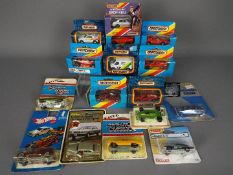 Matchbox - A collection of 9 x boxed 1980s Matchbox cars and 7 x carded models including James Bond